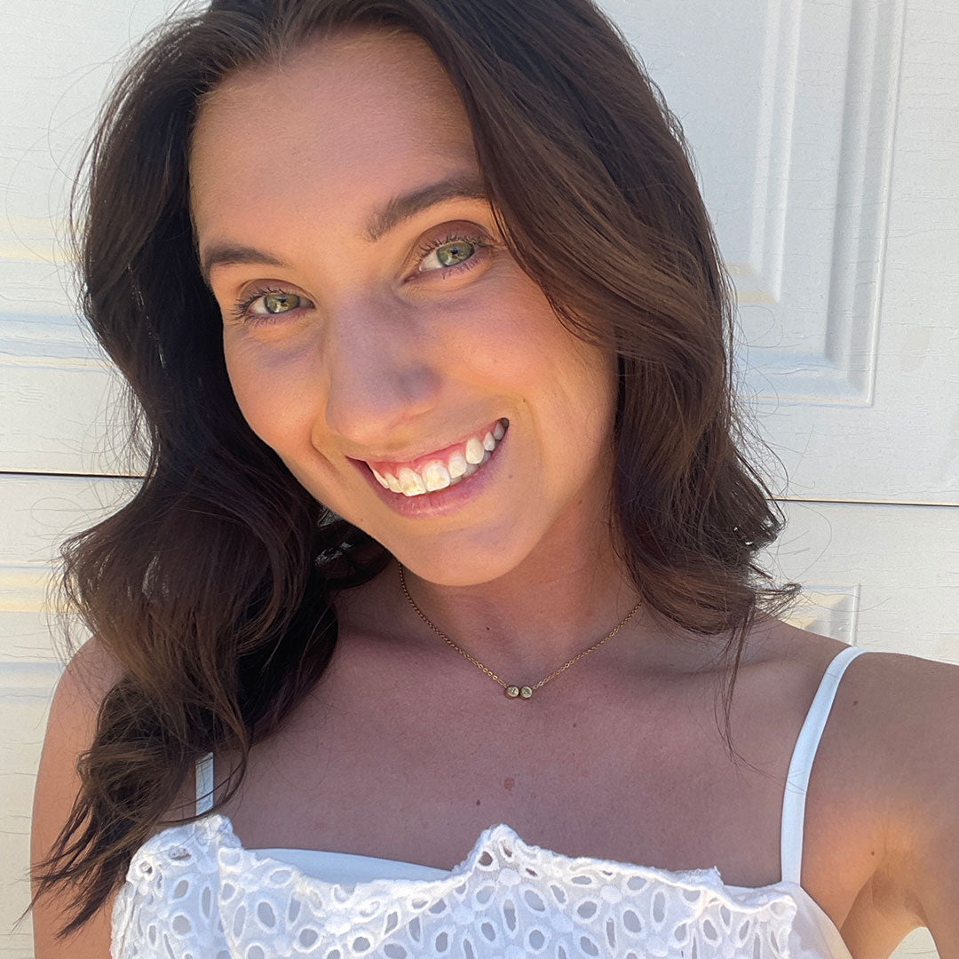 2 initial necklace in gold on model, free engraving, personalised jewellery, 2 different initial engraved on one necklace, waterproof and tarnish resisitant, free gift box, 100 day warranty, personalised gift, 